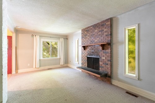 1194 18Th Avenue E, Vancouver, BC - Indoor Photo Showing Other Room With Fireplace