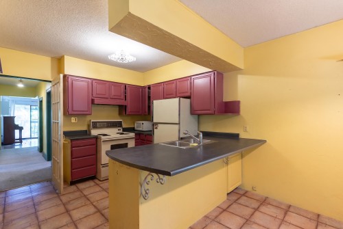1194 18Th Avenue E, Vancouver, BC - Indoor Photo Showing Kitchen With Double Sink