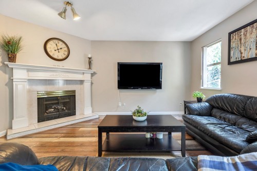 2225 Kaptey Avenue, Coquitlam, BC - Indoor Photo Showing Living Room With Fireplace