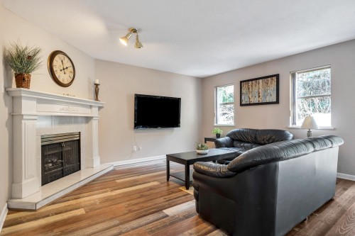 2225 Kaptey Avenue, Coquitlam, BC - Indoor Photo Showing Living Room With Fireplace