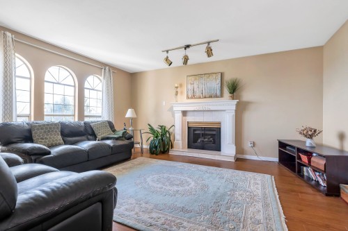2225 Kaptey Avenue, Coquitlam, BC - Indoor Photo Showing Living Room With Fireplace