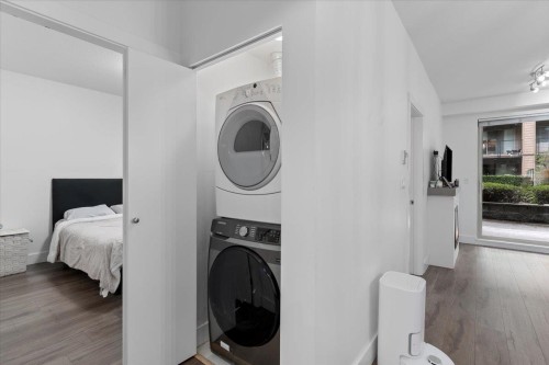 112-7478 Byrnepark Walk, Burnaby, BC - Indoor Photo Showing Laundry Room