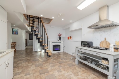 1038 Walls Avenue, Coquitlam, BC - Indoor With Fireplace