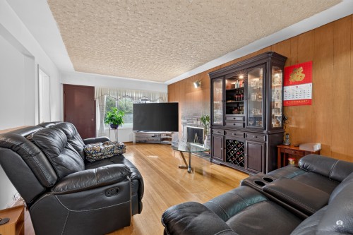 1828 Parker Street, Vancouver, BC - Indoor Photo Showing Living Room With Fireplace