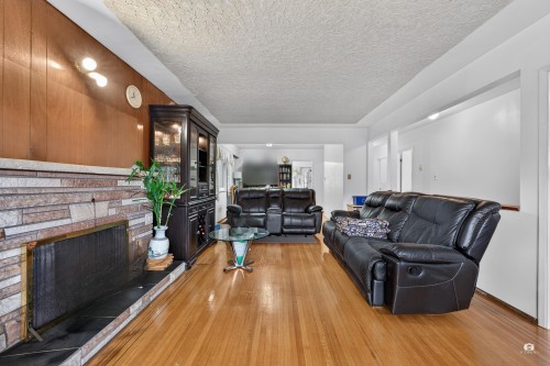 1828 Parker Street, Vancouver, BC - Indoor Photo Showing Living Room With Fireplace