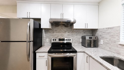 2184 35Th Avenue E, Vancouver, BC - Indoor Photo Showing Kitchen With Upgraded Kitchen