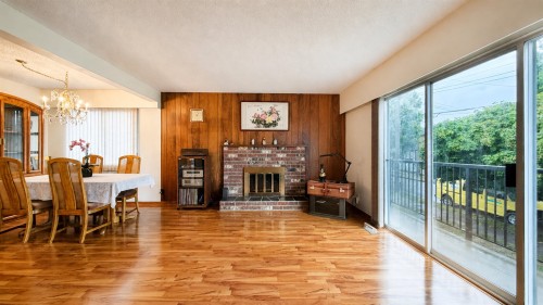 2184 35Th Avenue E, Vancouver, BC - Indoor Photo Showing Other Room With Fireplace