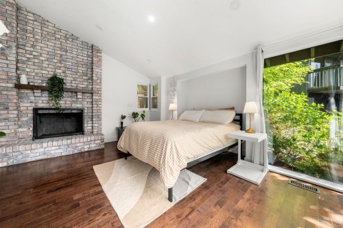 2086 Rivergrove Place, North Vancouver, BC - Indoor Photo Showing Bedroom With Fireplace
