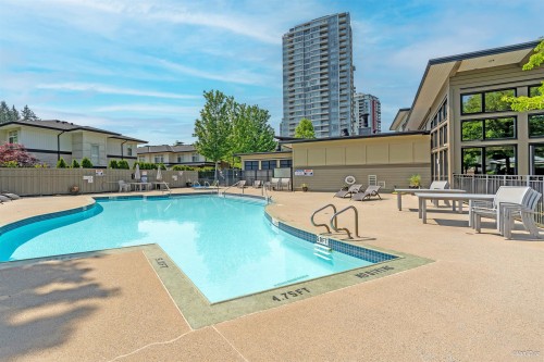 304-3100 Windsor Gate, Coquitlam, BC - Outdoor With In Ground Pool