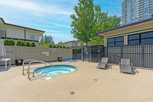 304-3100 Windsor Gate, Coquitlam, BC - Outdoor With In Ground Pool