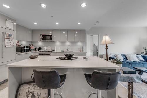 304-3100 Windsor Gate, Coquitlam, BC - Indoor Photo Showing Kitchen With Upgraded Kitchen