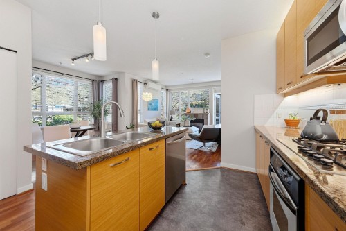 223-530 Raven Woods Drive, North Vancouver, BC - Indoor Photo Showing Kitchen With Double Sink