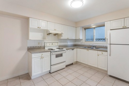8468 Osler Street, Vancouver, BC - Indoor Photo Showing Kitchen With Double Sink