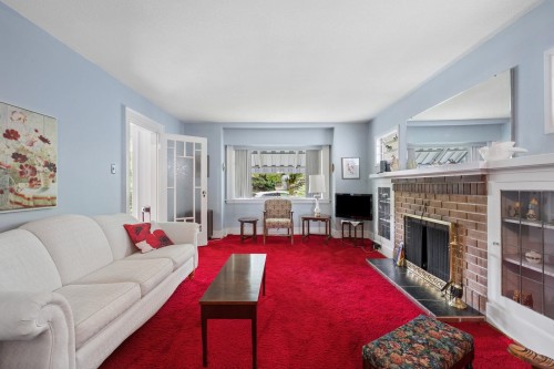 3149 King Edward Avenue W, Vancouver, BC - Indoor Photo Showing Living Room With Fireplace