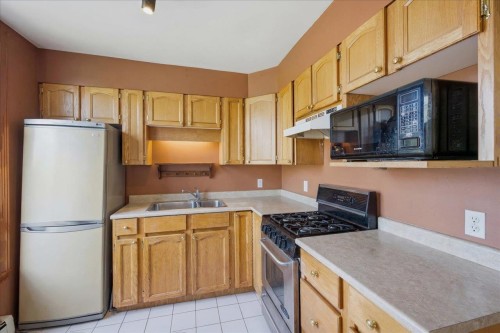 761 15Th Avenue E, Vancouver, BC - Indoor Photo Showing Kitchen With Double Sink