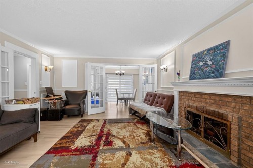 Upper-22939 128 Avenue, Maple Ridge, BC - Indoor Photo Showing Living Room With Fireplace