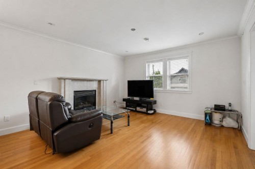 3795 Fleming Street, Vancouver, BC - Indoor Photo Showing Living Room With Fireplace