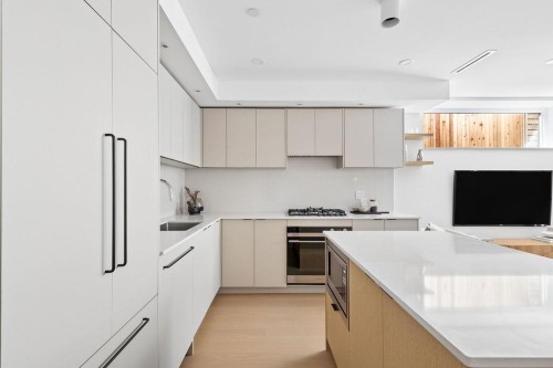 2-2124 8 Avenue E, Vancouver, BC - Indoor Photo Showing Kitchen With Upgraded Kitchen