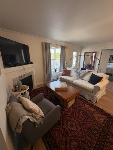 306-22347 Lougheed Highway, Maple Ridge, BC - Indoor Photo Showing Living Room With Fireplace