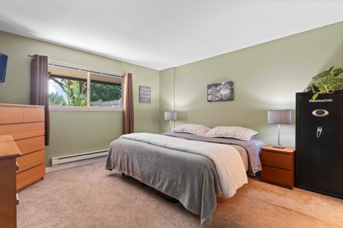 A102-4811 53 Street, Delta, BC - Indoor Photo Showing Bedroom