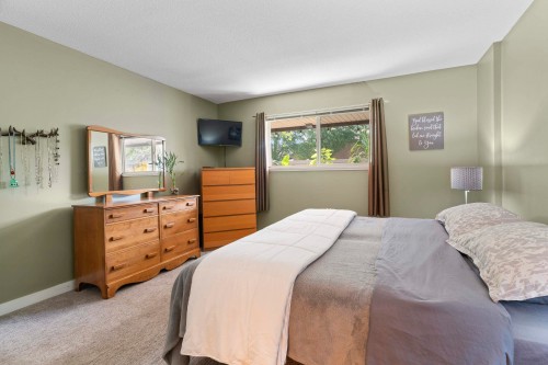 A102-4811 53 Street, Delta, BC - Indoor Photo Showing Bedroom