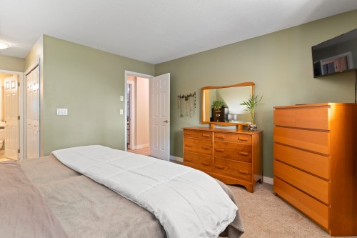 A102-4811 53 Street, Delta, BC - Indoor Photo Showing Bedroom
