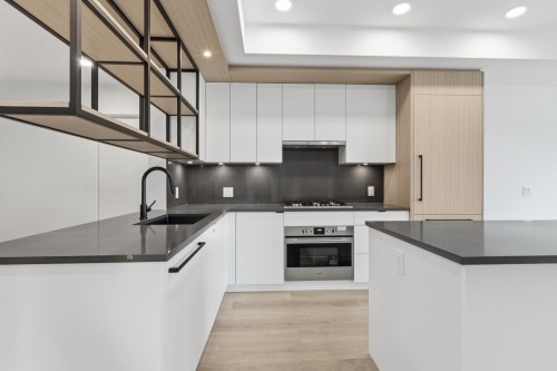 202-2268 Broadway E, Vancouver, BC - Indoor Photo Showing Kitchen With Upgraded Kitchen