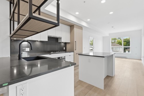 202-2268 Broadway E, Vancouver, BC - Indoor Photo Showing Kitchen With Upgraded Kitchen