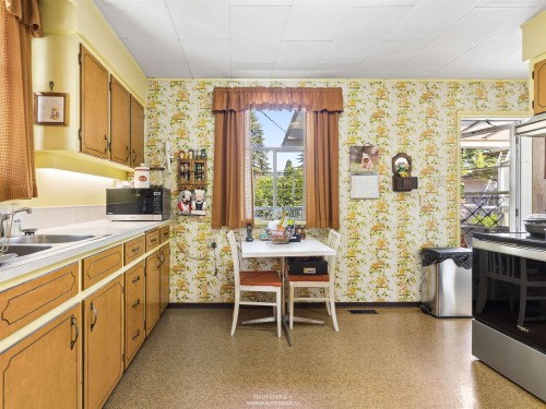 461 18Th Avenue W, Vancouver, BC - Indoor Photo Showing Kitchen With Double Sink