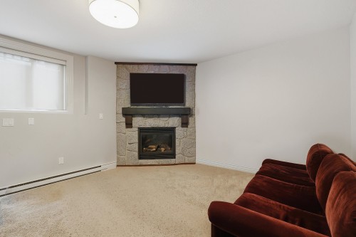 1225 Burkemont Place, Coquitlam, BC - Indoor Photo Showing Living Room With Fireplace