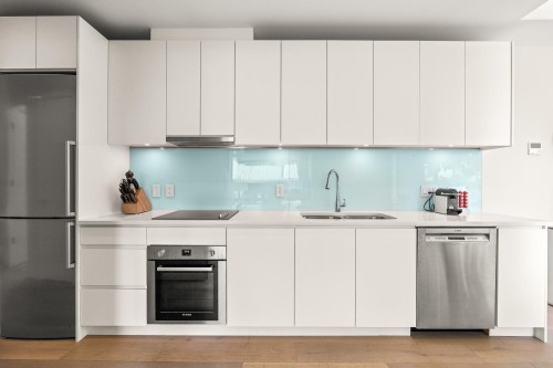 202-1591 Bowser Avenue, North Vancouver, BC - Indoor Photo Showing Kitchen With Double Sink