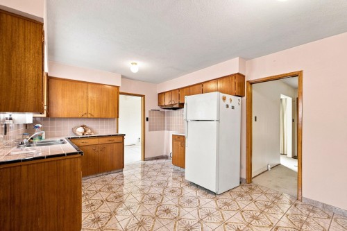 1955 Turner Street, Vancouver, BC - Indoor Photo Showing Kitchen With Double Sink