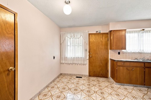 1955 Turner Street, Vancouver, BC - Indoor Photo Showing Kitchen With Double Sink