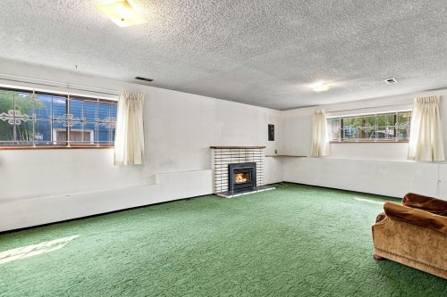 1955 Turner Street, Vancouver, BC - Indoor Photo Showing Other Room With Fireplace