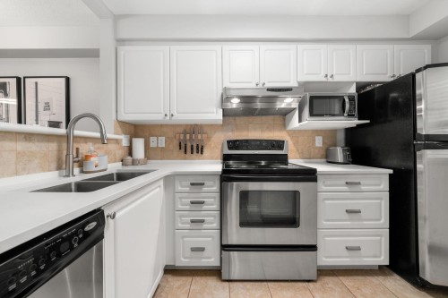 249-2565 Broadway W, Vancouver, BC - Indoor Photo Showing Kitchen With Double Sink