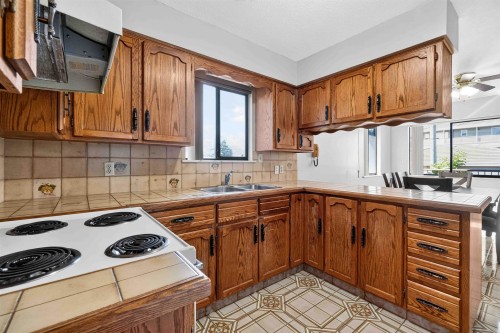 2739 E 8Th Avenue, Vancouver, BC - Indoor Photo Showing Kitchen With Double Sink