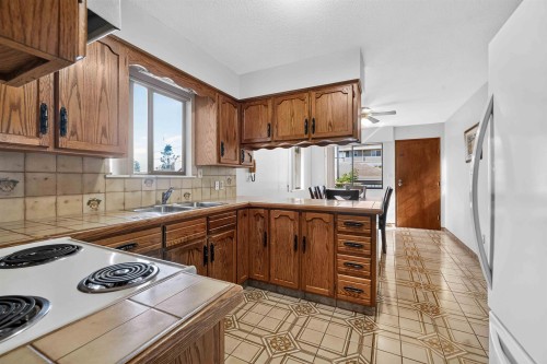2739 E 8Th Avenue, Vancouver, BC - Indoor Photo Showing Kitchen With Double Sink