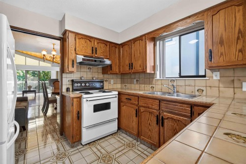 2739 E 8Th Avenue, Vancouver, BC - Indoor Photo Showing Kitchen With Double Sink