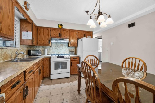 2739 E 8Th Avenue, Vancouver, BC - Indoor Photo Showing Kitchen With Double Sink