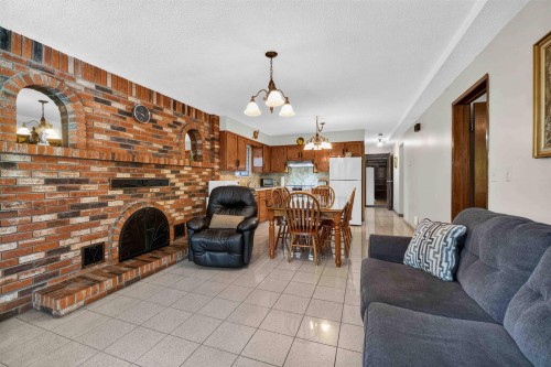 2739 E 8Th Avenue, Vancouver, BC - Indoor Photo Showing Living Room With Fireplace