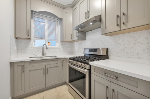 5887 Battison Street, Vancouver, BC - Indoor Photo Showing Kitchen With Double Sink With Upgraded Kitchen