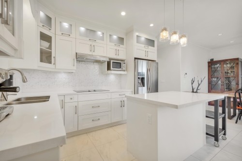 5887 Battison Street, Vancouver, BC - Indoor Photo Showing Kitchen With Double Sink With Upgraded Kitchen