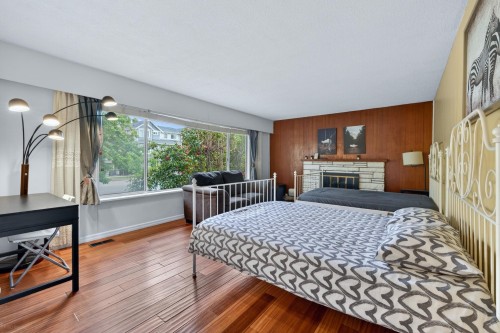 9031 No. 2 Road, Richmond, BC - Indoor Photo Showing Bedroom With Fireplace