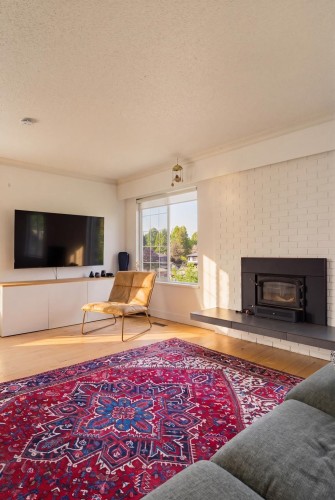 2554 7Th Avenue E, Vancouver, BC - Indoor Photo Showing Living Room With Fireplace
