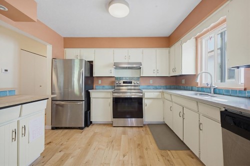 2554 7Th Avenue E, Vancouver, BC - Indoor Photo Showing Kitchen With Double Sink