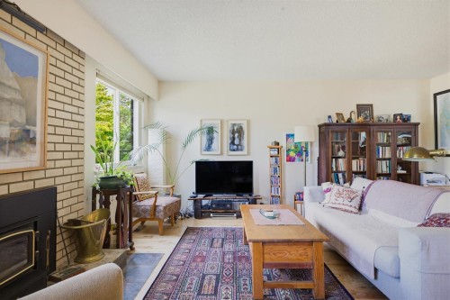 2554 7Th Avenue E, Vancouver, BC - Indoor Photo Showing Living Room With Fireplace