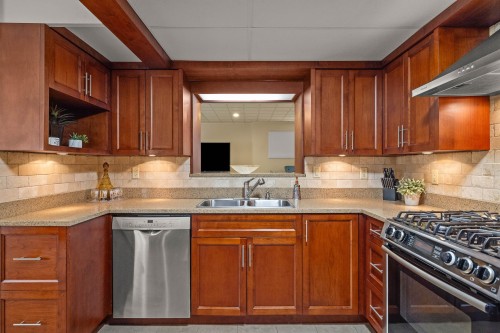 2515 45Th Avenue E, Vancouver, BC - Indoor Photo Showing Kitchen With Double Sink