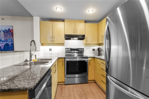 307-9298 University Crescent, Burnaby, BC - Indoor Photo Showing Kitchen With Double Sink With Upgraded Kitchen
