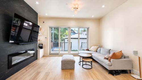 3214 King Edward Avenue W, Vancouver, BC - Indoor Photo Showing Living Room With Fireplace