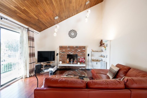 6496 Quebec Street, Vancouver, BC - Indoor Photo Showing Living Room With Fireplace